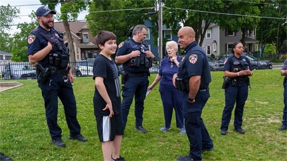 Police Officers with Child