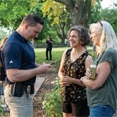 Police Officer Talking with Residents