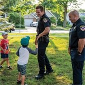 Police Officers with Kids at Event
