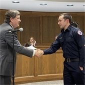 Mayor Suess Shaking Hands with Firefighter