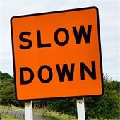Slow Down Sign
