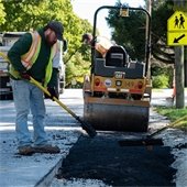 Employee Performing Roadwork