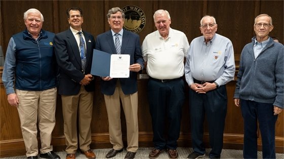 Members of the Rotary Club of Wheaton and the Rotary Club of Wheaton A.M.
