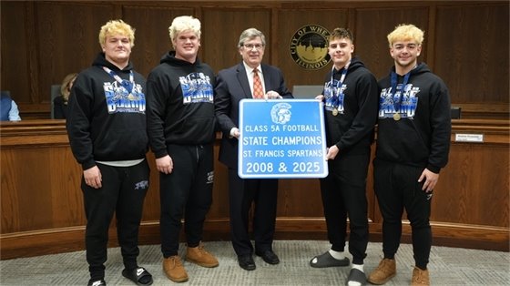 Mayor Suess with St. Francis High School Football Players