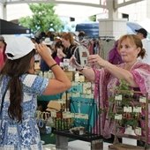 French Market Shopper Trying on Hat