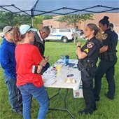 Police Officers Talking with Residents