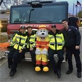 Firefighters with Sparky the Fire Dog
