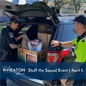 Police Officer with Food Donations