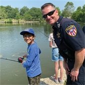 Police Officer Fishing with Child