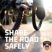 Bike Graphic with the Words Share the Road Safely
