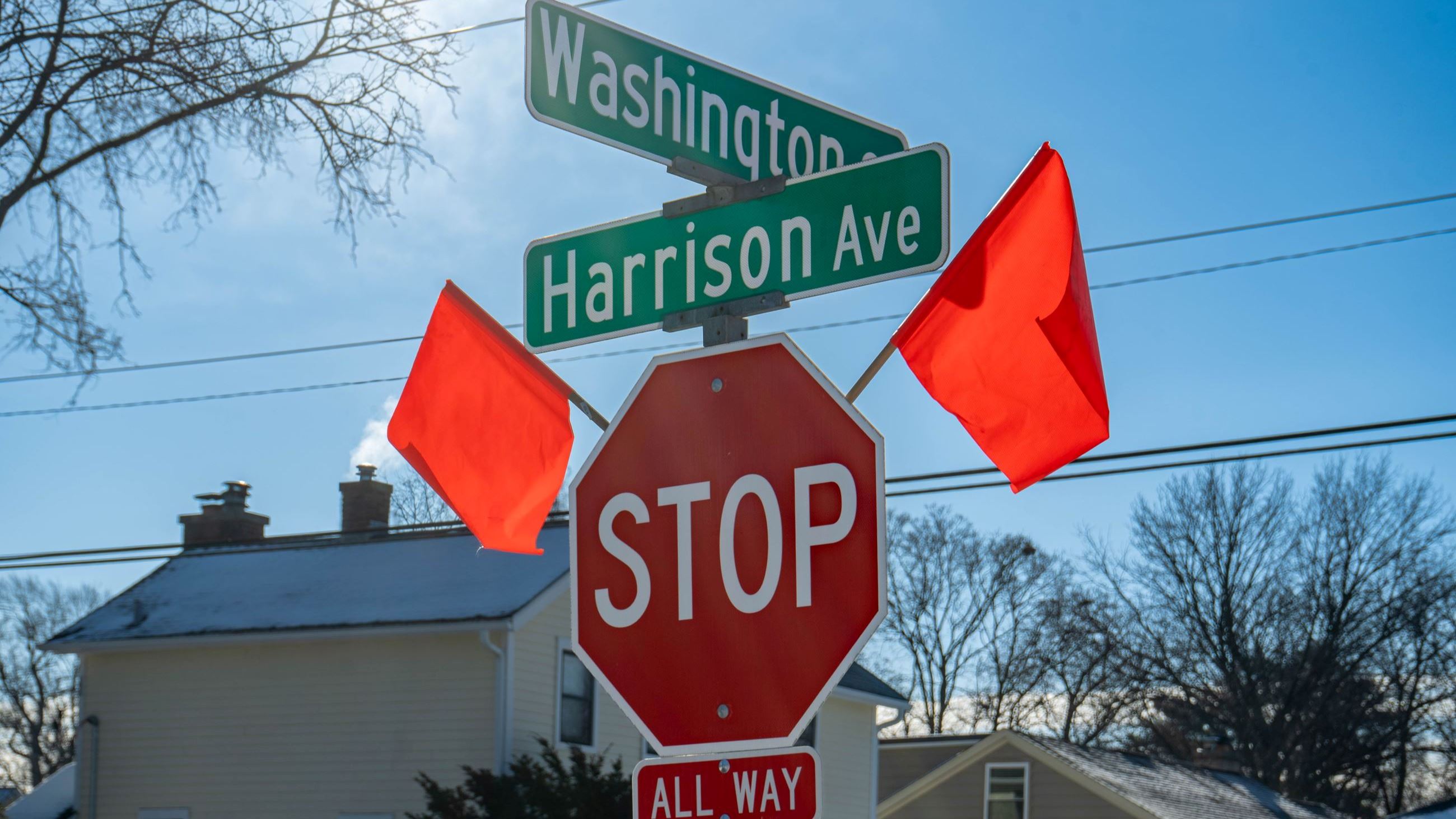 Intersection of Harrison and Washington street signs